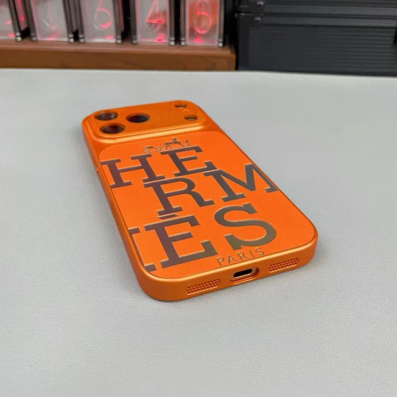 Premium orange leather iPhone case with bold designer typography