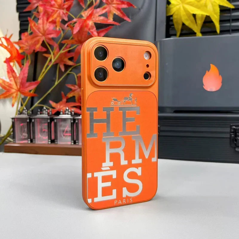Premium orange leather iPhone case with bold designer typography