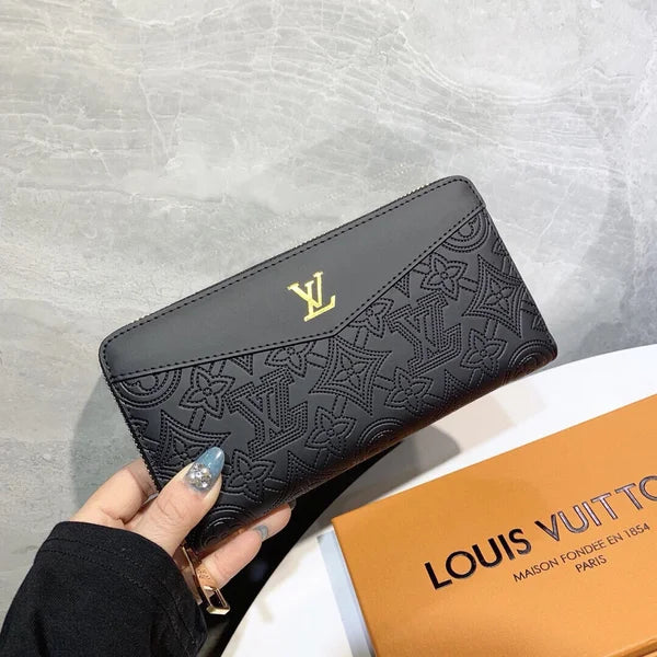 Louis Vuitton Wallet Made of Leather Embossed with the Brand's Logo
