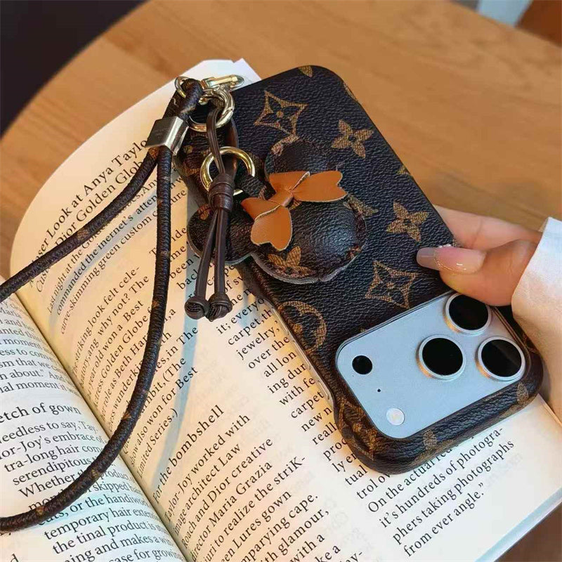 Luxury Monogram Case with Bow Charm & Wrist Lanyard for iPhone 12-18 Pro & Pro Max