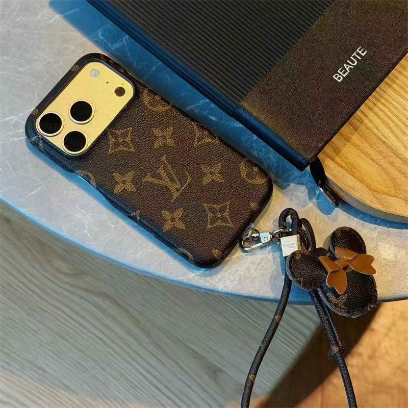 Luxury Monogram Case with Bow Charm & Wrist Lanyard for iPhone 12-18 Pro & Pro Max