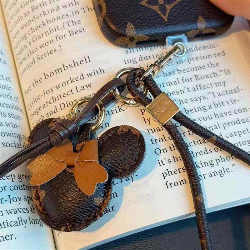 Luxury Monogram Case with Bow Charm & Wrist Lanyard for iPhone 12-18 Pro & Pro Max